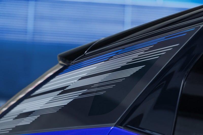 Close-up of the Modern Pattern on the 2026 OPTIQ-V Rear Quarter Glass | Al Serra Cadillac in Grand Blanc MI